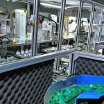 Laundry Detergent Cap Assembly Machine For Simultaneous Assembly Of Two Sizes Of