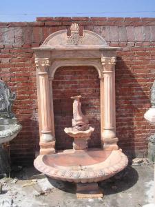 China Pink Marble Fish Statue Columns Carved Stone Wall Fountain on sale