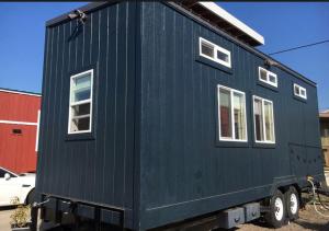 China OEM Custom Tiny House Prefabricated / Fully Furnished Tiny Homes With Trailer Wheel on sale