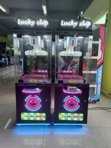 China Brazil popular arcade clip mini machine lucky clip prize machine 24 clips coin operated vending machine on sale
