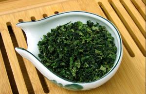Best Fujian Brown Crystal Organic Oolong Tea Iron Goddess Tea Leaves wholesale
