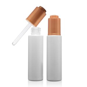 China Customized Essential Oil Press Push Dropper Bottle Serum Package 30 Ml Glass Bottle Container on sale