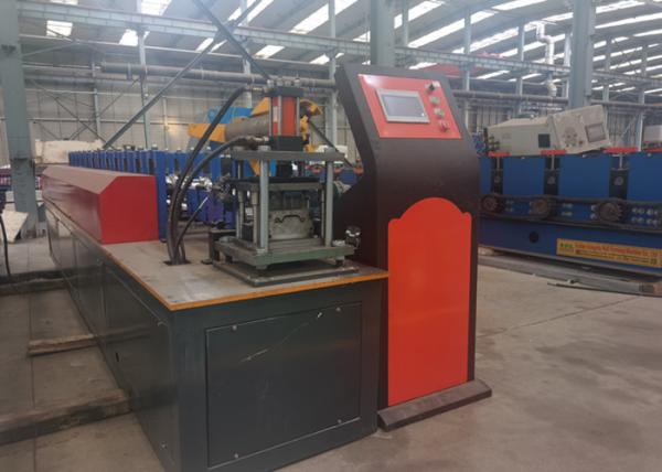 Cheap 5.6mx1.2mx1.3m Shutter Door Roll Forming Machine Hydraulic Cutting Device for sale