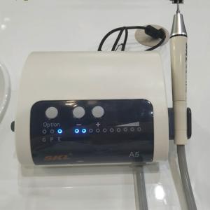 China LED Handpiece Dental Teeth Cleaning System Scaling Machine Ultrasonic Scaler on sale