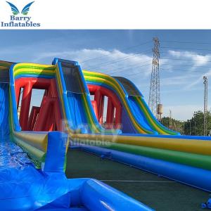 China Fire Proof Outdoor Backyard Inflatable Water Slides Games For Jumping on sale