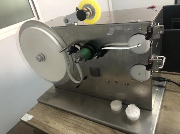 Cheap Semi-Automatic HME Filter Tape Winding Machine with ±0.2mm Labeling Error Allowance and Cutting for sale