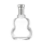 China Custom Shape 700ml Transparent Liquor Glass Bottle for Your Business Needs for sale