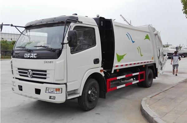 Cheap Dongfeng 4*2	Garbage Compactor Truck 120Hp Self Loading and Discharge Garbage Truck for sale