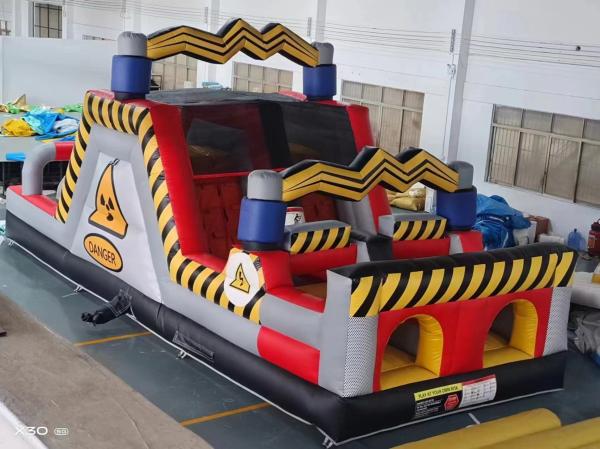 Cheap Danger Obstacles Inflatable Bounce House Castles With Two Slides for sale