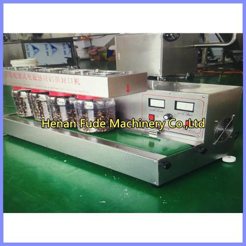 Cheap peanut butter bottle sealing machine, chilli sauce bottle sealing machine for sale