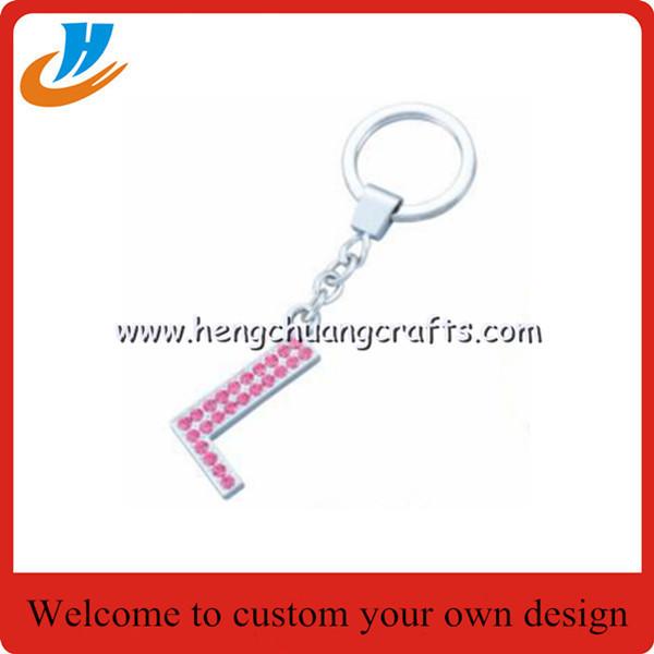 Cheap Custom personalised cool keyrings/keychain with name with your own design for sale