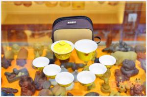 Best Purple Clay Yixing Teapot Set With 6 Cups Personalized Home Use Yellow Color wholesale