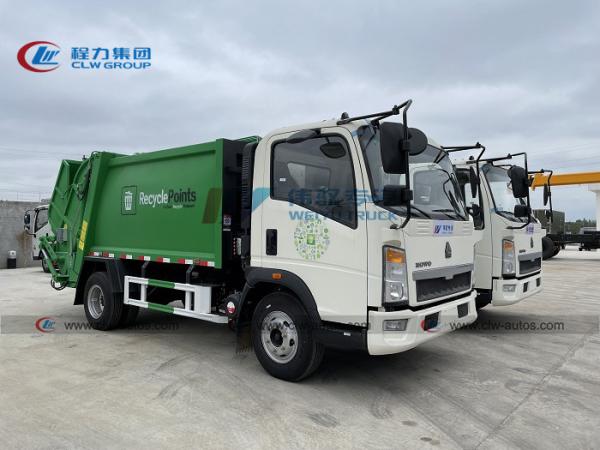 Cheap Howo LHD 6m3 Hydraulic Compression Garbage Truck for sale