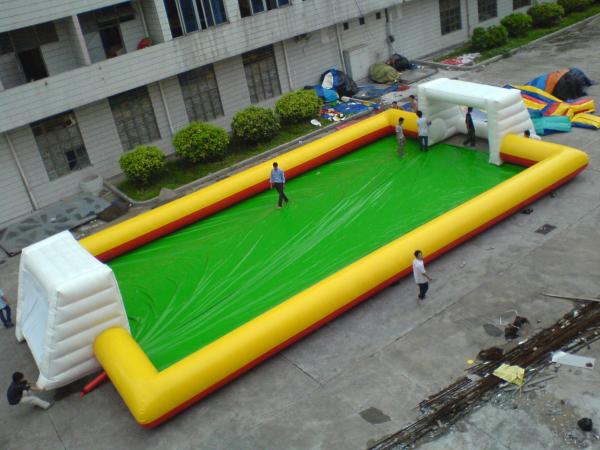 Cheap Yellow With Blue Inflatable Soap Soccer Field For Commercial Use for sale