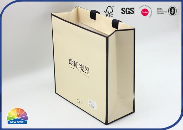 Cheap Brown Folding Paper Shopping Bags Matte Lamination With Ribbon Handle for sale