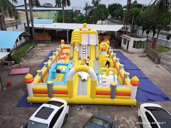 Cheap Yellow Duck With Big Slides And Bouncy Jumping Inflatable Castle for sale