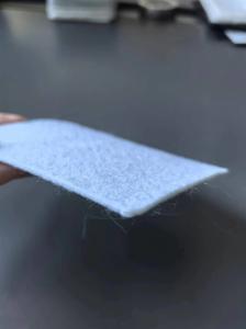 Two-cloth-one-membrane composite membrane used in water conservancy projects